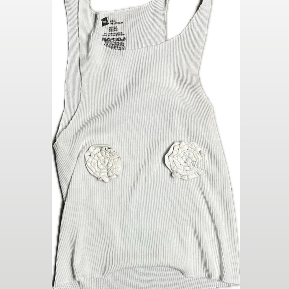 Handmade white tank with conveniently-placed florets